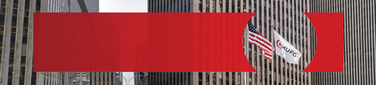 Image of the American Flag and MUFG logo flag in front of building.